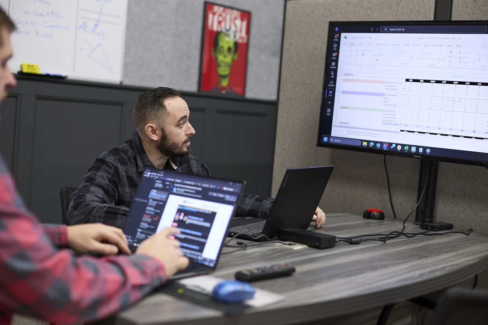 Black Rock teammates planning technology around the table